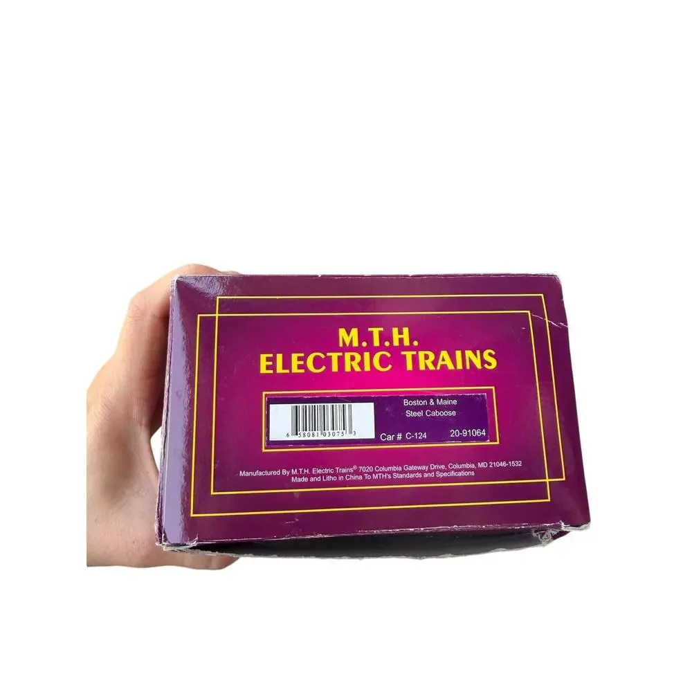 M.T.H. O Scale Boston & Maine Steel Caboose (20-91064)